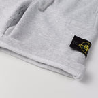 Stone Island shorts hem with black patch and yellow logo
