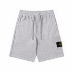 Stone Island grey drawstring shorts with elastic waistband and side patch