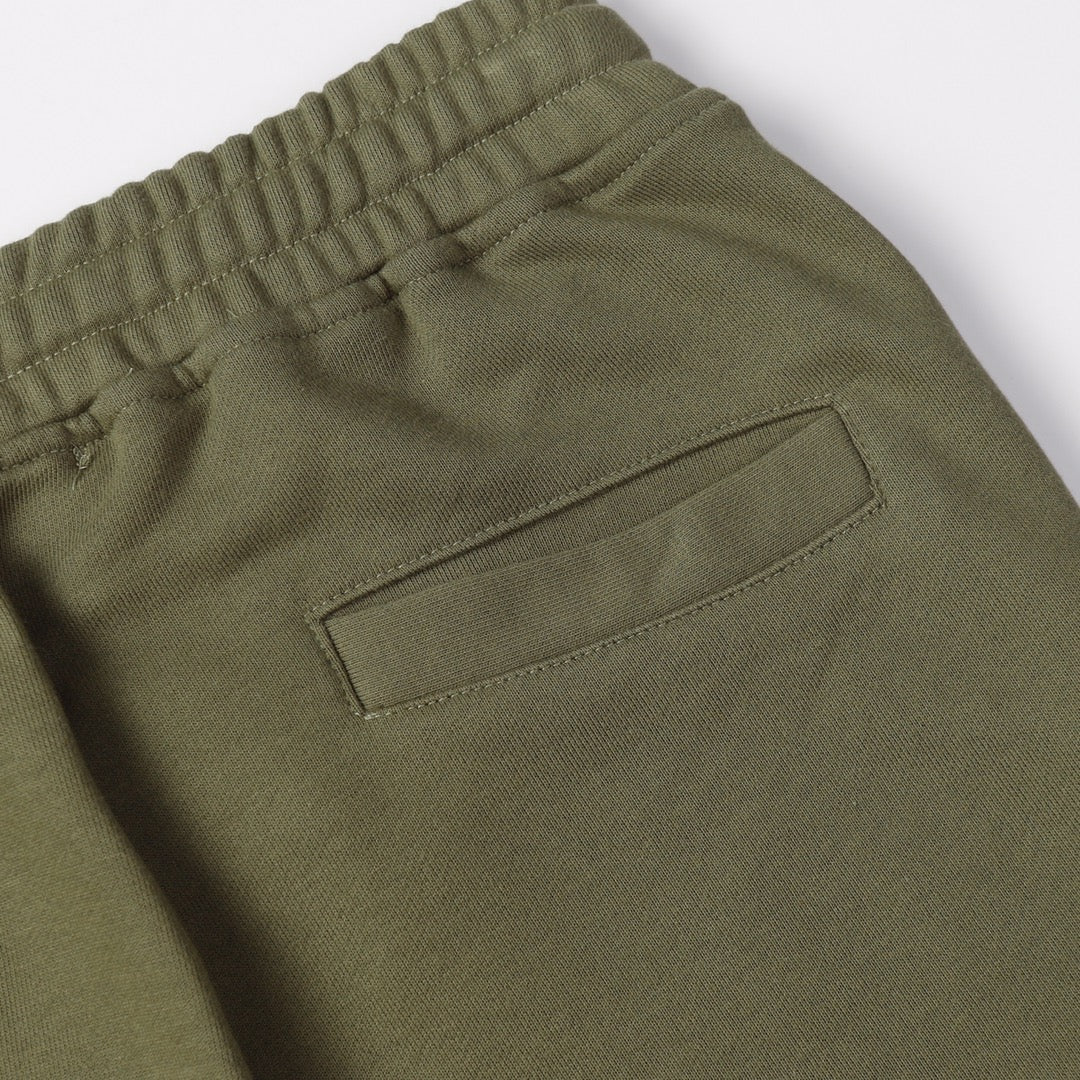 Olive shorts with elastic waistband and rectangular side pocket