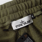 Olive shorts waistband with Stone Island label and black drawstring cord