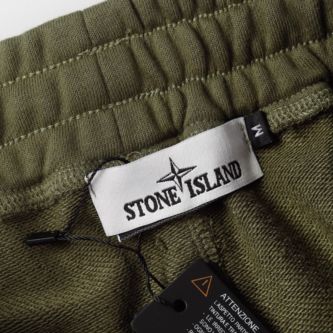 Olive shorts waistband with Stone Island label and black drawstring cord
