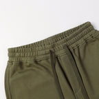 Olive drawstring shorts front with elastic waistband and drawstring ties