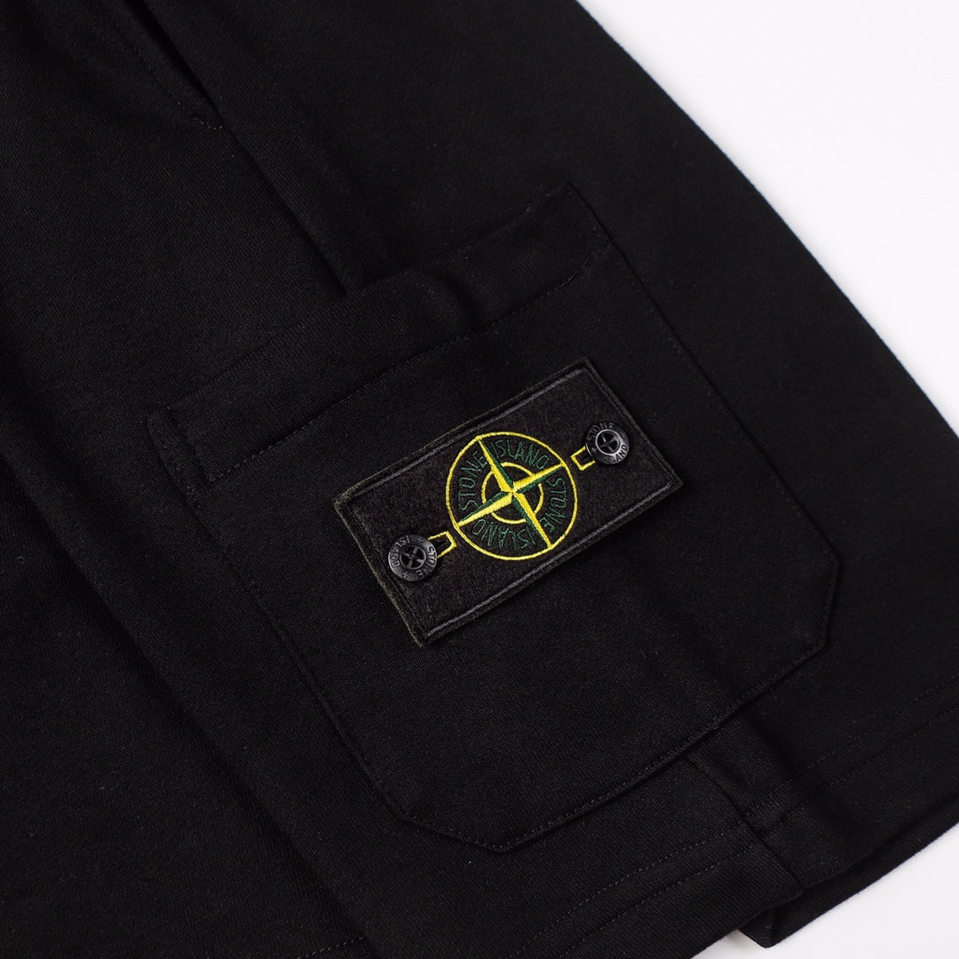 Black shorts with stitched front pocket and patch logo detail