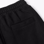 Black shorts with elastic waistband and front patch pocket