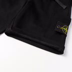 Black shorts hem with logo patch on pocket and stitched cuff