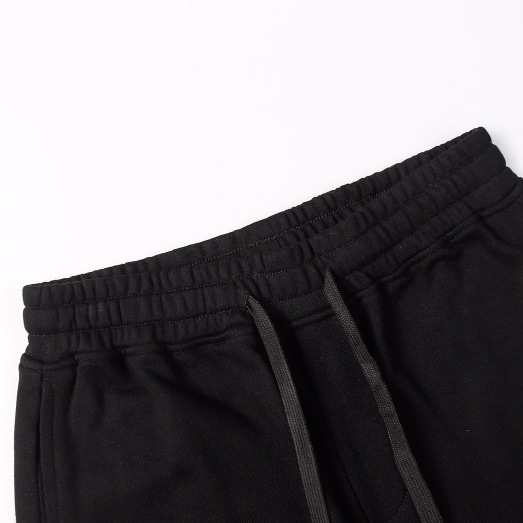 Black shorts with elastic waistband and black drawstring