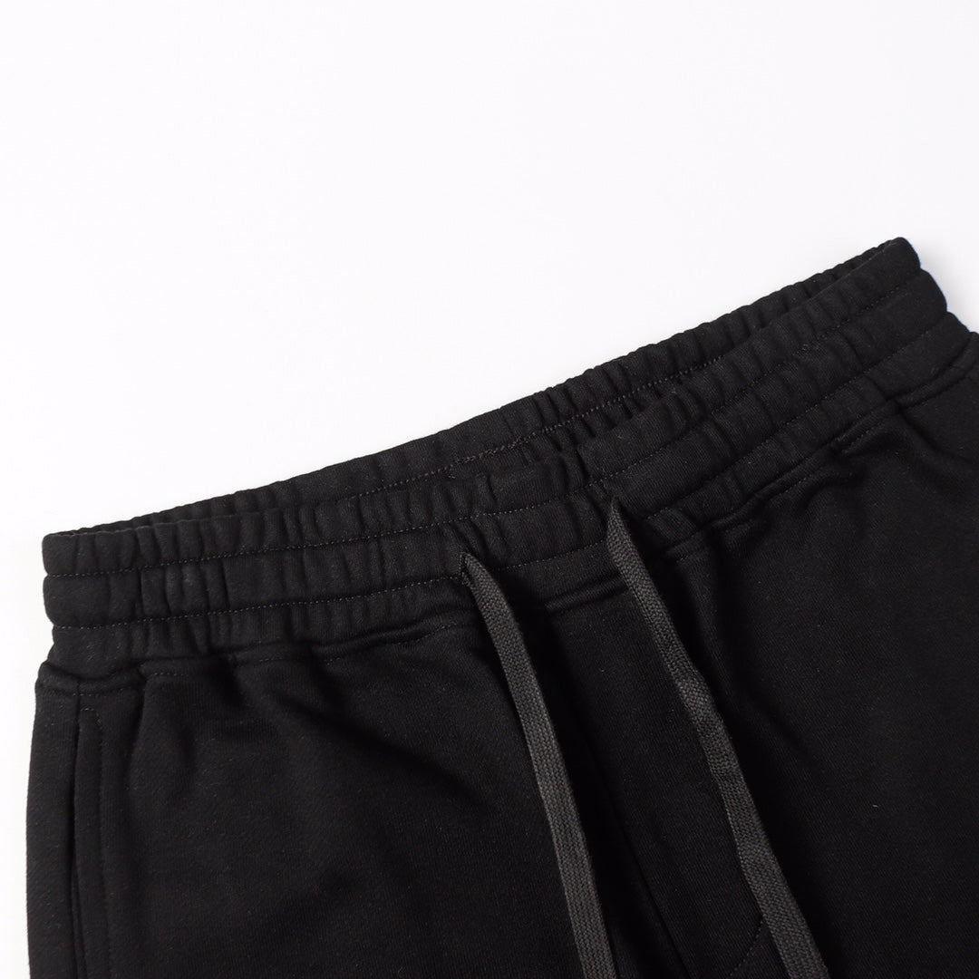 Black shorts with elastic waistband and black drawstring
