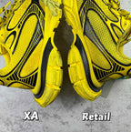 Balenciaga unisex yellow sneakers, close-up of side panels and black accents