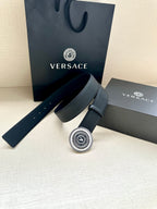 Versace belt with dark blue leather strap and round gold-tone logo buckle