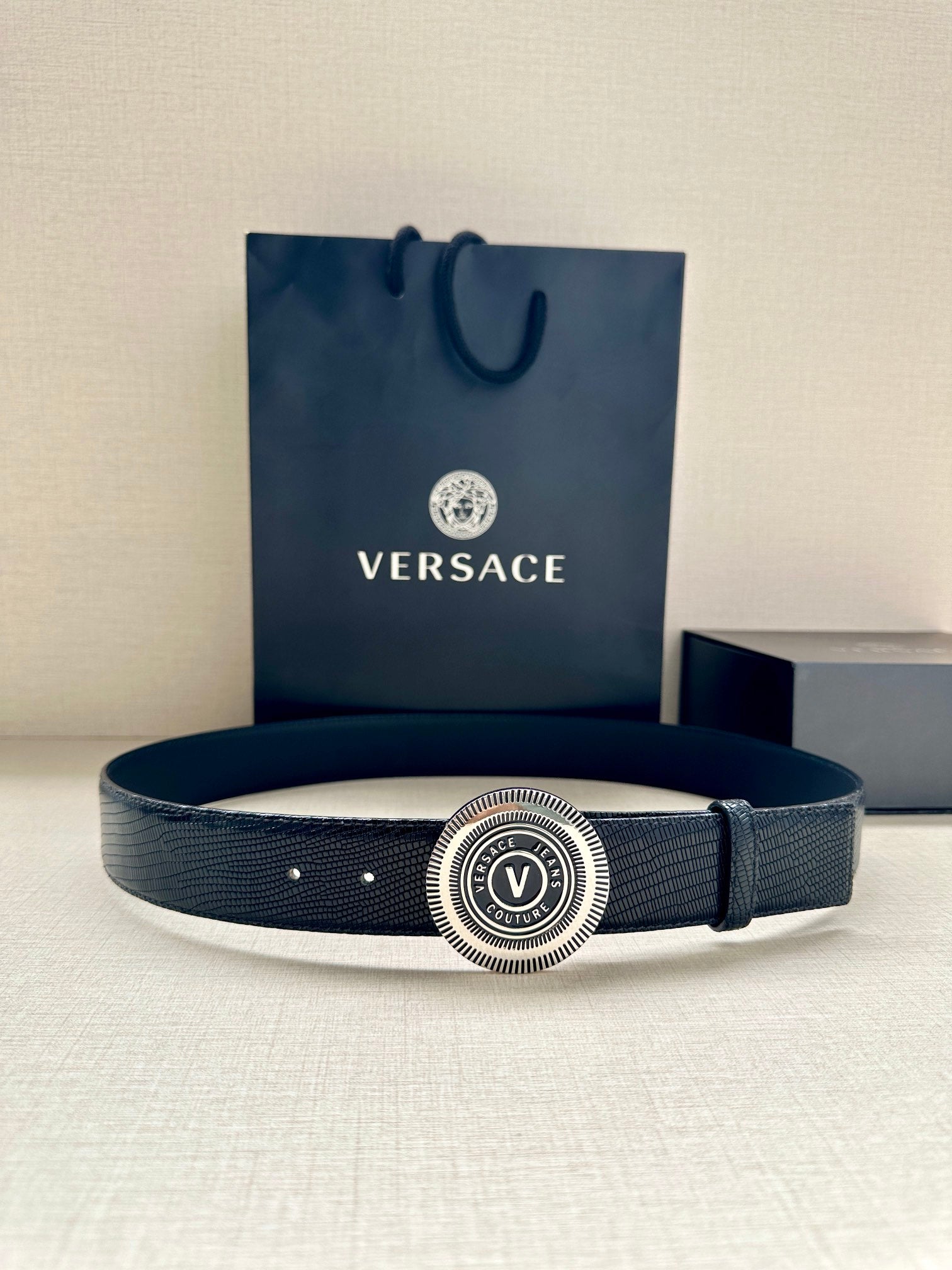 Versace Belt, navy leather-look strap with round gold-toned logo buckle