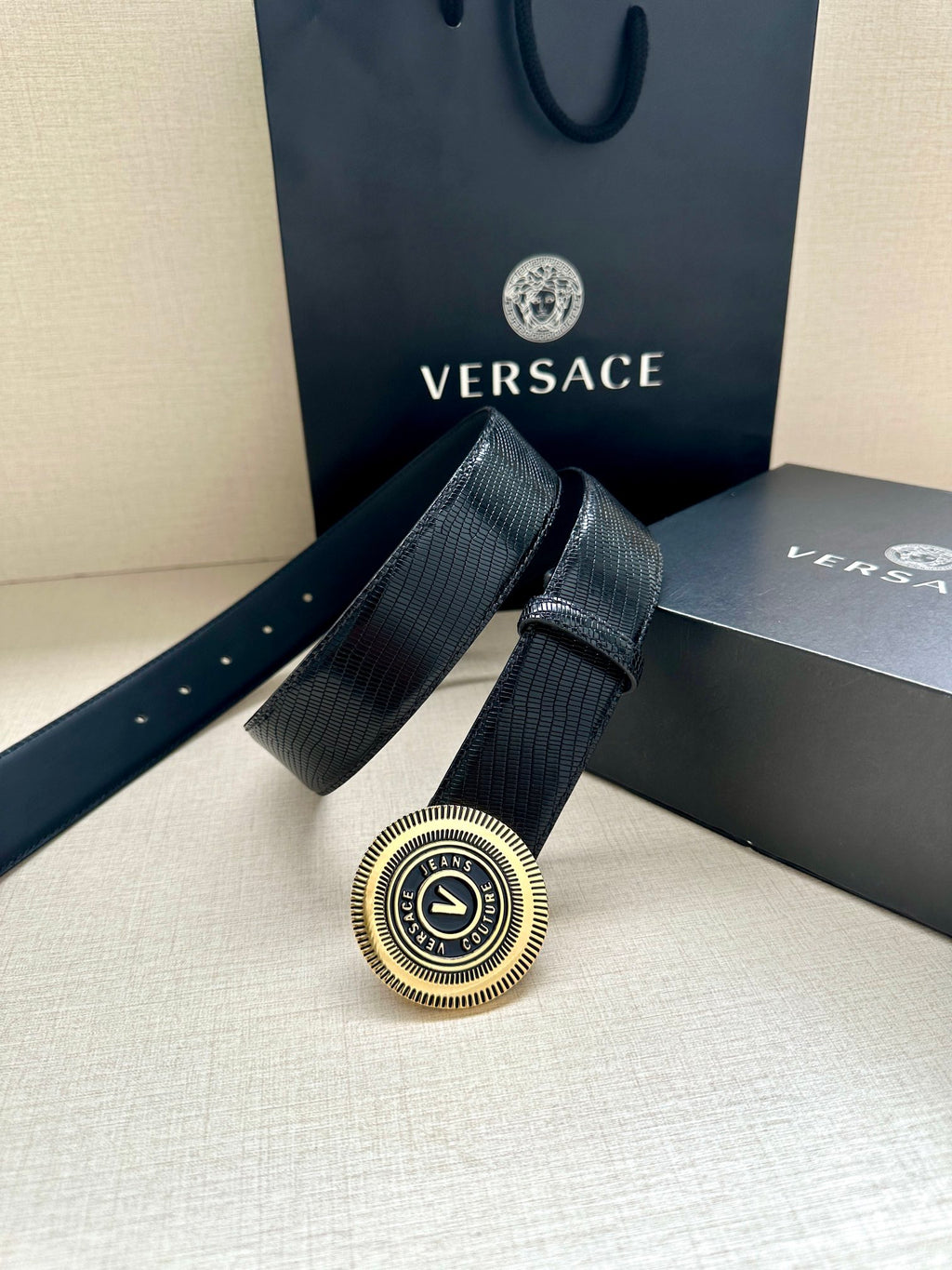 Versace Belt, navy textured strap with round gold-toned logo buckle