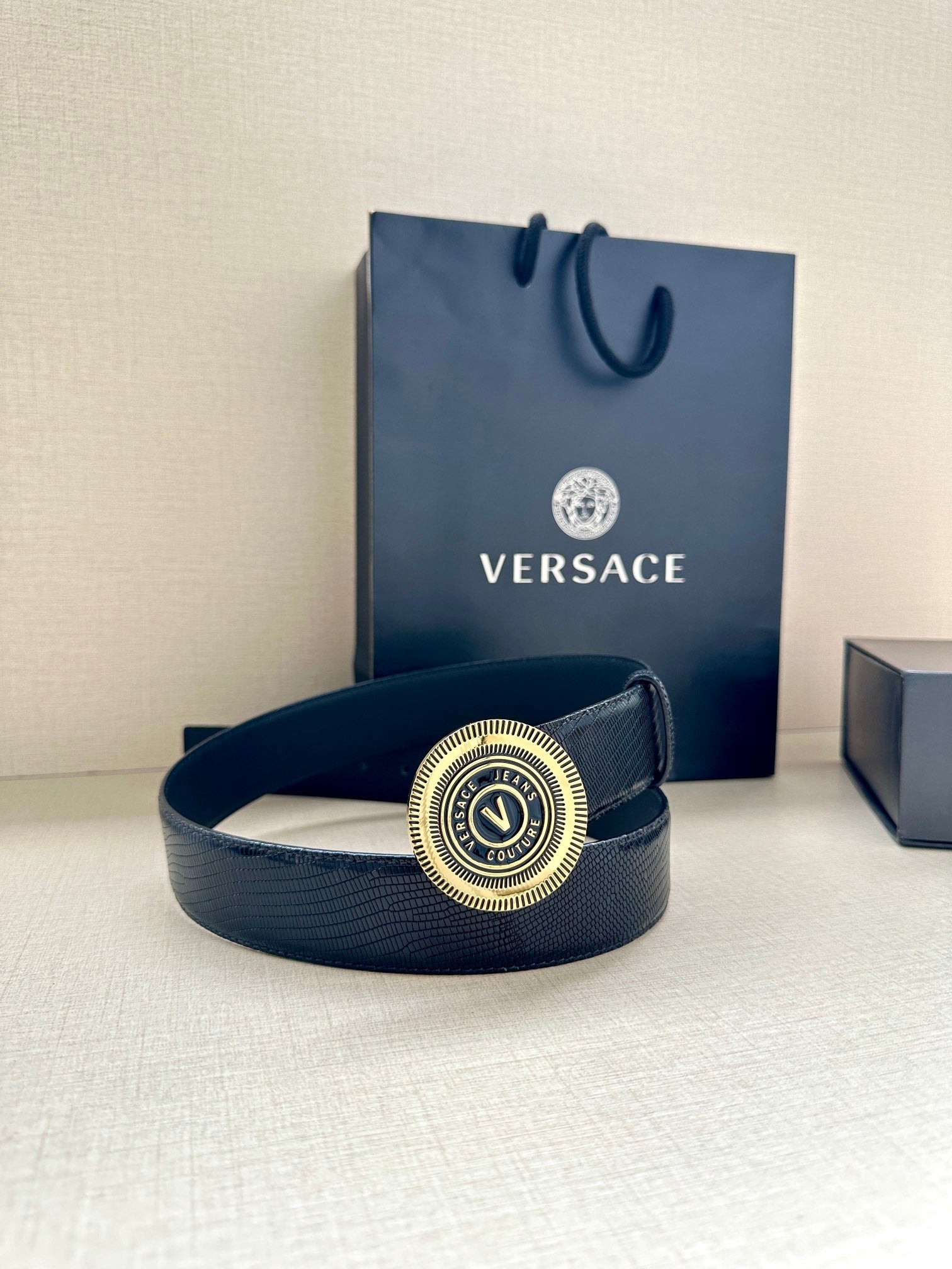 Versace Belt, navy strap with round gold-toned logo buckle