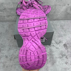 Pink Balenciaga sneakers showing treaded outsole pattern and chunky sole