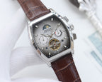 Rolex watch with silver dial and brown leather strap, stainless steel tonneau case