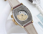 Rolex watch back with engraved case and brown leather strap, gold-tone hardware