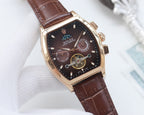 Rolex watch with dark dial and brown leather strap, rose-gold tone tonneau case