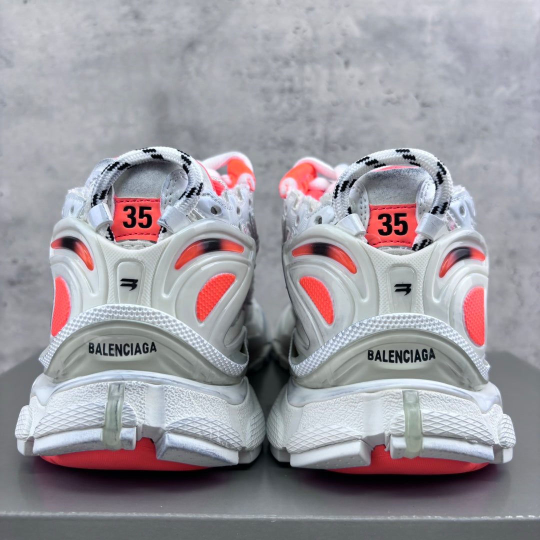 Unisex sneakers back view with size '35' tags, white panels, and red accent details