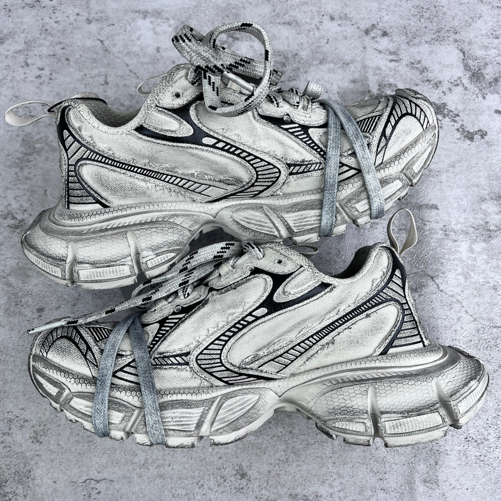 Balenciaga unisex sneakers front view in silver with black trim and blue laces