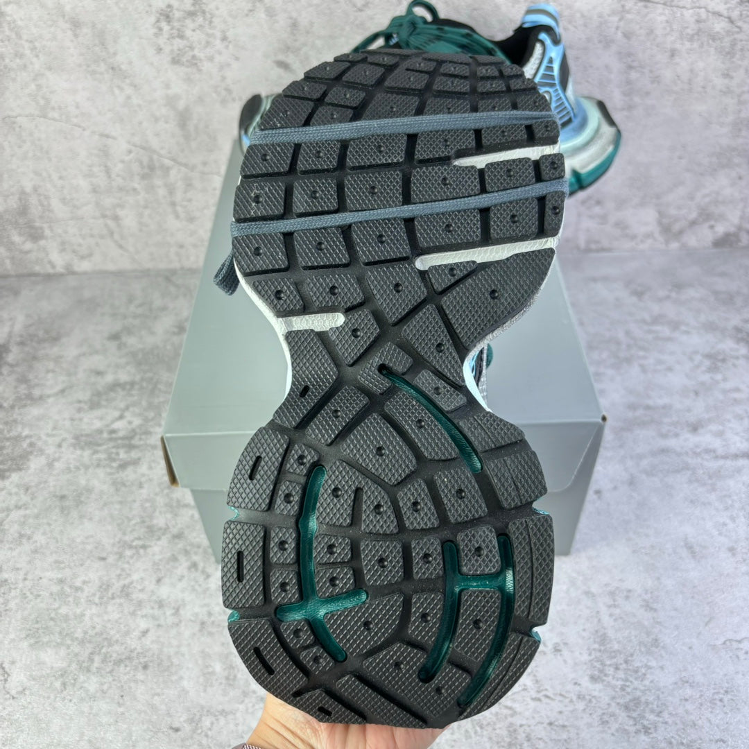 Balenciaga unisex sneaker outsoles, dark rubber tread with teal side accents