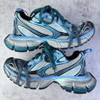 Balenciaga unisex sneakers pair, light blue mesh with teal laces and chunky gray sole