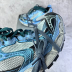 Balenciaga unisex sneakers close-up, light blue textured panels with teal laces
