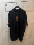 Black Balenciaga short-sleeve T-shirt with orange flame chest graphic and sleeve print