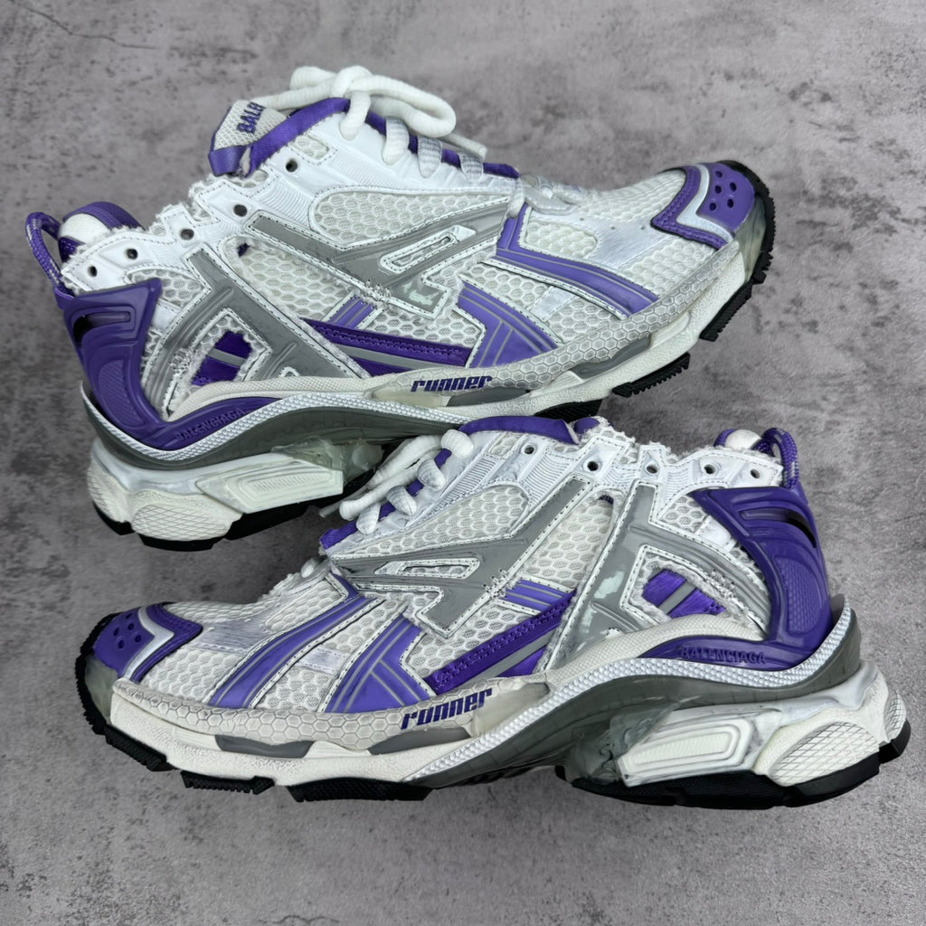 Unisex runner sneakers with white mesh upper, purple accents, and white laces