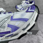 Unisex runner sneakers side view, white textured panels with purple trim and laces