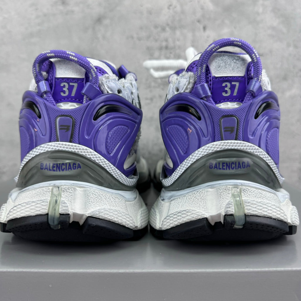 Unisex runner sneakers heel view, purple back panels and BALENCIAGA logo details