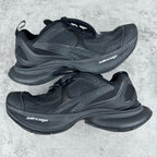 Unisex Balenciaga sneakers in dark gray/black with lace-up front and sculpted sole