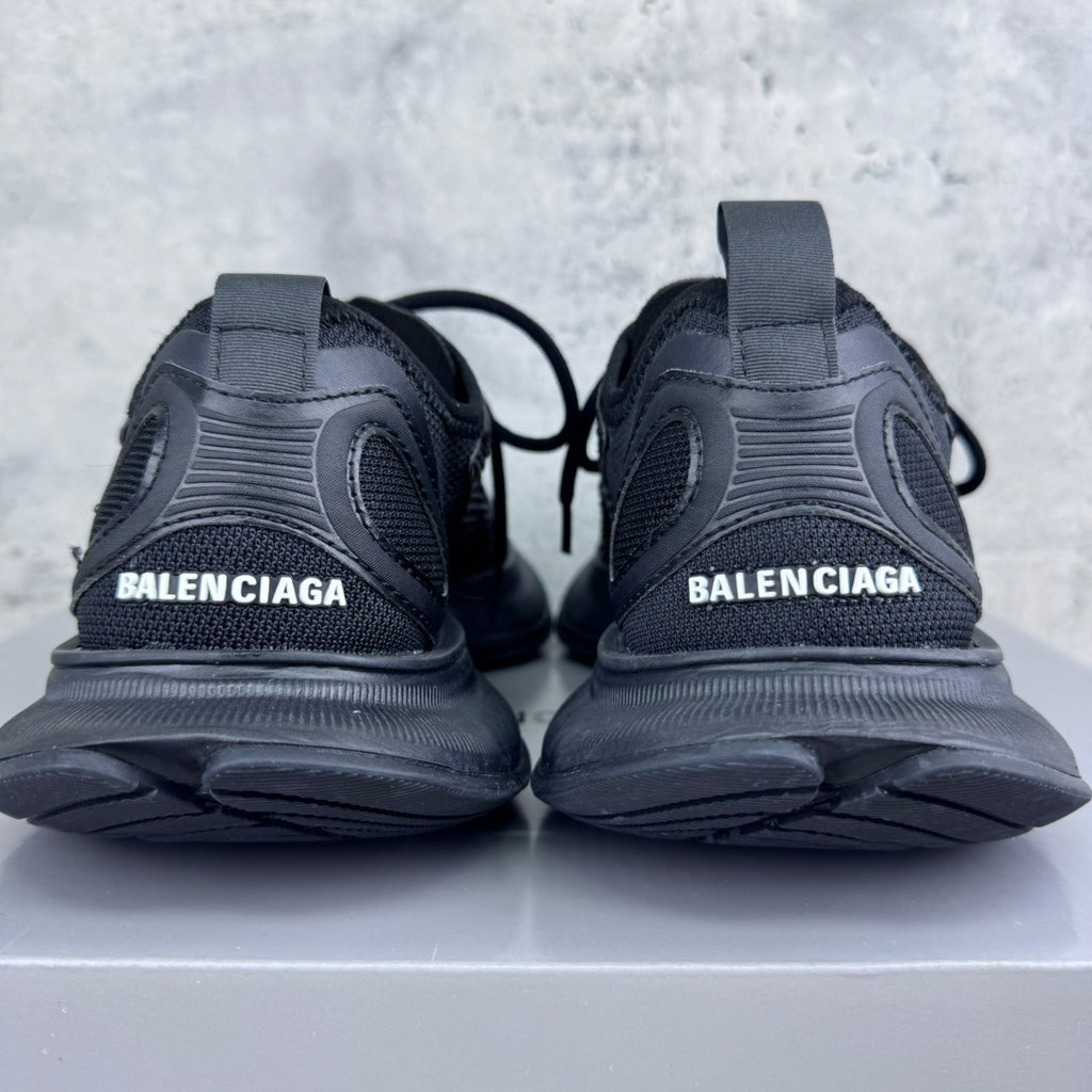 Back view of dark gray/black lace-up unisex sneakers with BALENCIAGA on heel