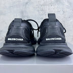 Back view of dark gray/black lace-up unisex sneakers with BALENCIAGA on heel