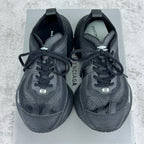 Pair of dark gray/black lace-up unisex sneakers with BALENCIAGA branding on uppers