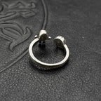Silver-tone open cuff ring with spherical ends