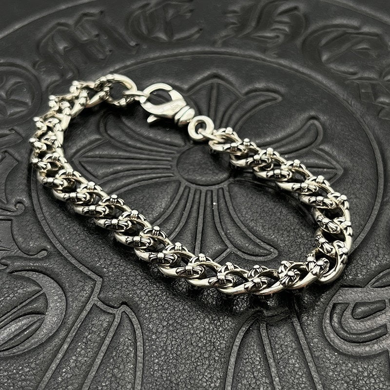 Chrome bracelet with silver-toned curb and oval link chain