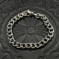 Chrome bracelet with silver-toned curb chain and ring clasp