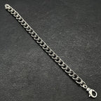 Chrome bracelet chain with silver-toned links and ring clasp