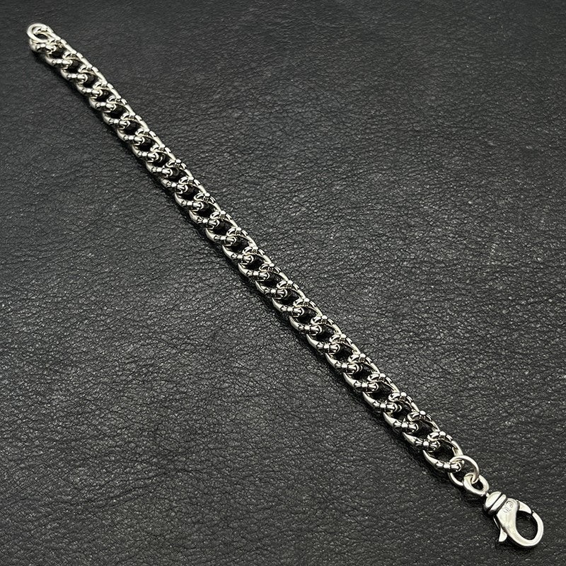 Chrome bracelet chain with silver-toned links and ring clasp