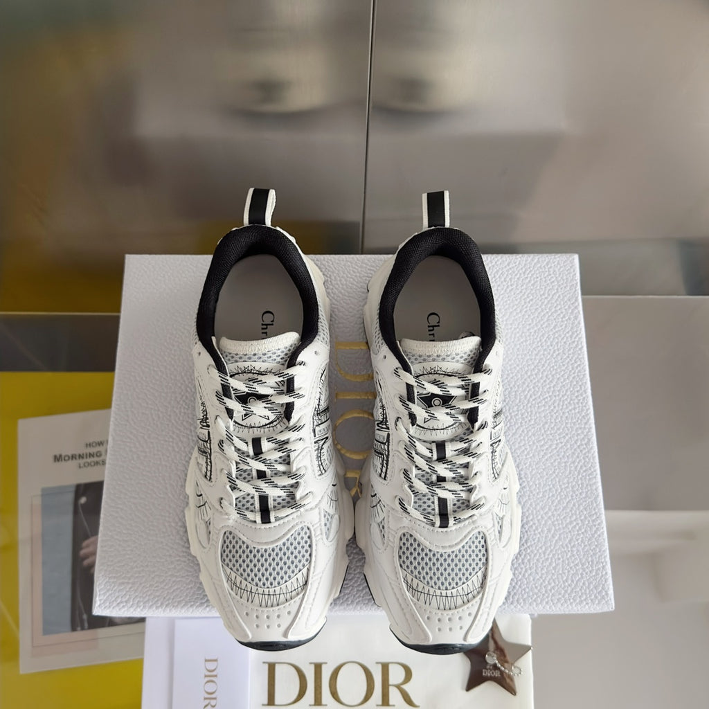 Unisex white lace-up sneakers with black collar lining and patterned panels