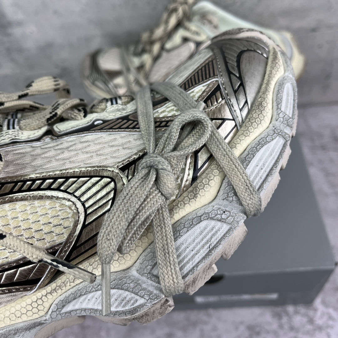 Balenciaga unisex sneaker close-up with lace-up straps, mesh overlays, and textured trim