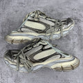 Balenciaga unisex sneakers with lace-up straps, mesh panels, and thick rubber sole