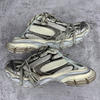 Balenciaga unisex sneakers with lace-up straps, mesh panels, and thick rubber sole