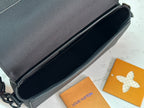 Men's black zippered bag interior with smooth lining and top opening