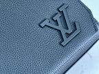 Black textured leather bag with raised LV-style emblem detail