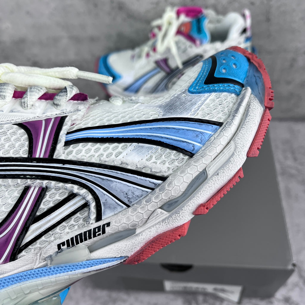 Balenciaga runner sneaker side view, white mesh with blue stripes and purple trim