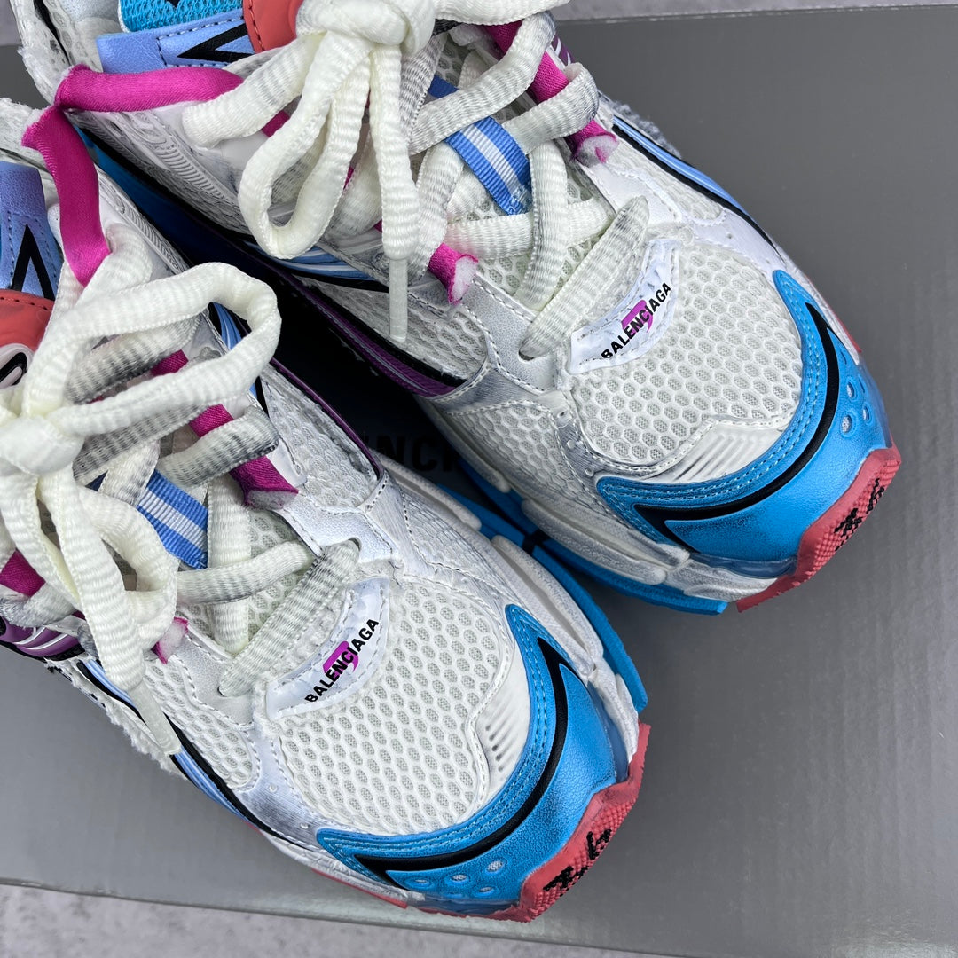 Balenciaga runner sneakers, close-up of white laces and tongue with BALENCIAGA branding