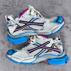 Balenciaga unisex runner sneakers, full pair view with white mesh and blue sole