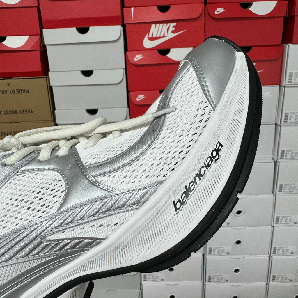 White unisex sneaker with side logo print and textured mesh upper