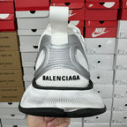 White unisex sneaker heel with BALENCIAGA logo and black rubber midsole