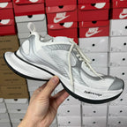White Balenciaga unisex sneakers with mesh upper and lace-up front